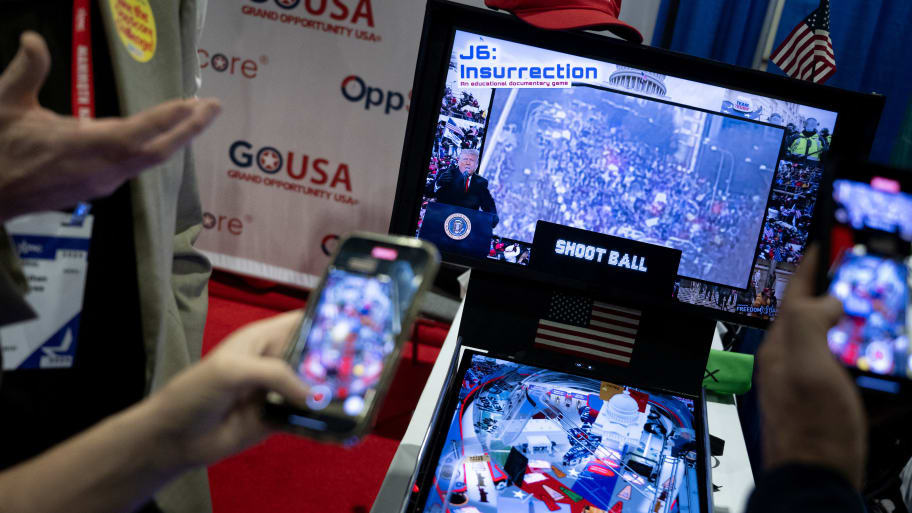 An electronic pinball game from Patriot Dawg Games based on January 6th is displayed during the Conservative Political Action Conference (CPAC) in National Harbor, Maryland.