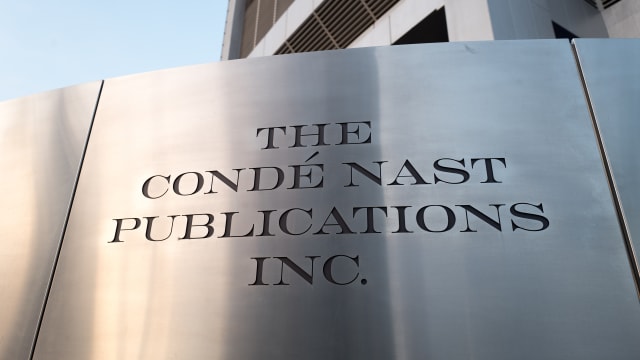 A photo of an office building with a sign reading, “The Conde Nast Publications Inc.” 
