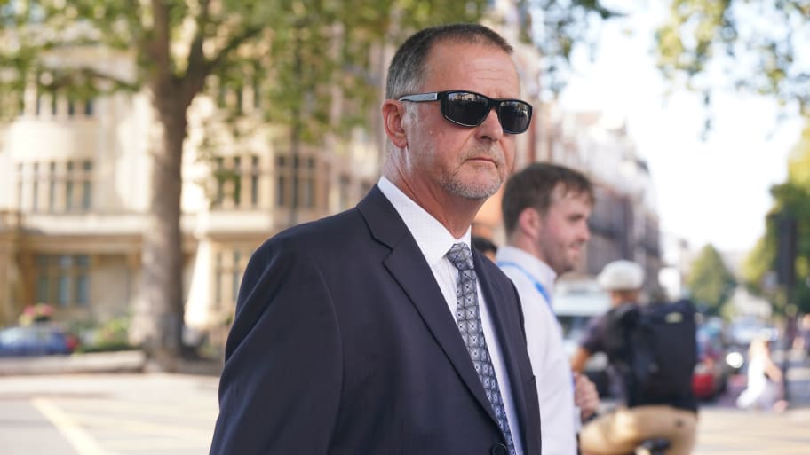 Trevor Lewton, one of six Metropolitan Police officers, leaving Westminster Magistrates' Court in central London, after pleading guilty to charges of sending grossly offensive racist messages.