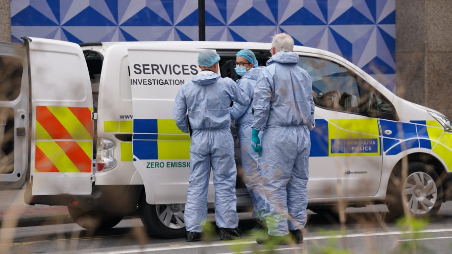 Forensic investigators at the scene near the Whitgift shopping centre in Croydon, south London after a 15-year-old girl was stabbed to death.