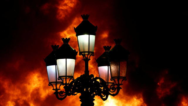 Dublin's Five Lamps street lights are seen engulfed in flames.