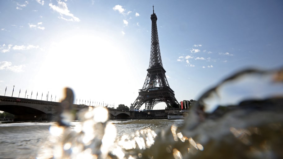 The swimmers are meant to take to the water at the Alexandre III bridge.