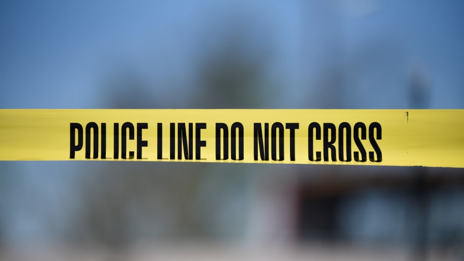 Crime scene tape blocks off an area designated for the media at the scene of a blast at a FedEx facility in Schertz, Texas.