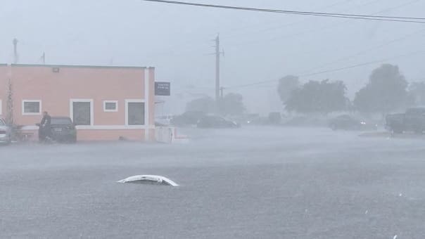 A general view shows a flooded street in Fort Lauderdale, Florida, April 12, 2023, in this screen grab obtained from social media. 