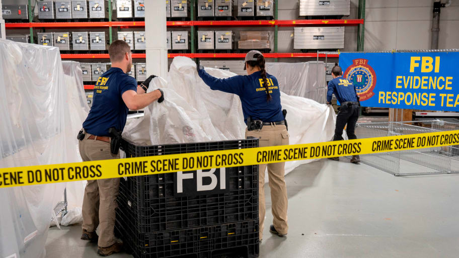 FBI agents unpack recovered tech from the Chinese surveillance balloon shot down Feb. 4.