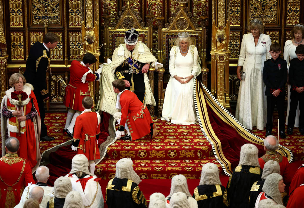 King Charles III sits alongside Britain's Queen Camilla during the State Opening of Parliament, at the Houses of Parliament, in London, on July 17, 2024.