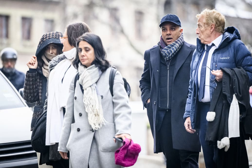 Indian-Swiss billionaire family members Namrata Hinduja (L) and Ajay Hinduja (2ndR) arrive at the Geneva's courthouse with their lawyers Yael Hayat (C) and Robert Assael (R) at the opening day of their trial for human trafficking on January 15, 2024.
