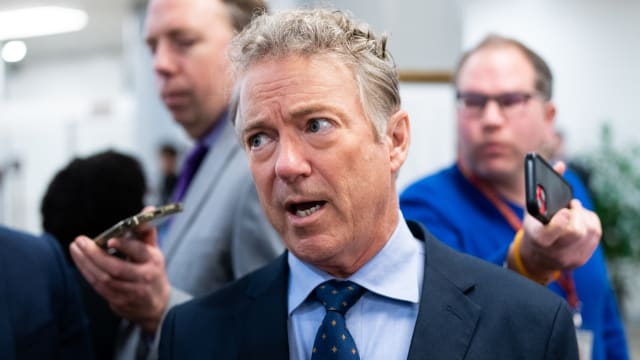 Sen. Rand Paul, R-Ky., speaks to reporters as he arrives for a vote in the U.S. Capitol on Thursday, March 14, 2024. 