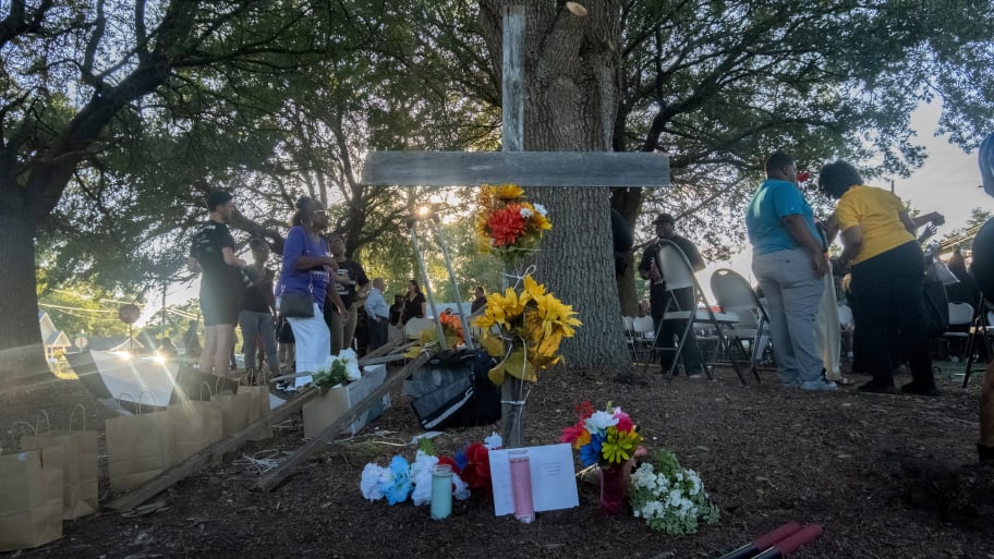 Mourners attend a prayer vigil a day after a white man armed with a high-powered rifle and a handgun killed three Black people at a Dollar General store in Jacksonville, Florida, U.S. August 27, 2023.  
