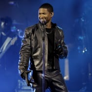 Usher singing.