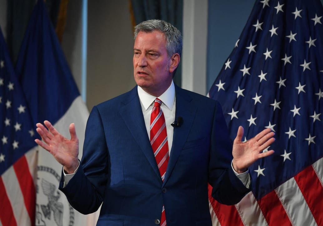 A photo including New York City Mayor Bill de Blasio