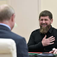 A photo of Ramzan Kadyrov with Vladimir Putin.