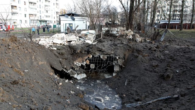 A shell crater formed at the site of falling fragments of a Russian rocket in Sviatoshynskyi district of Kyiv