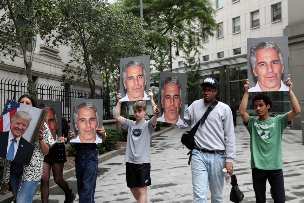 Protesters demonstrated against Jeffrey Epstein as he awaited arraignment for sex trafficking minors in July 2019.
