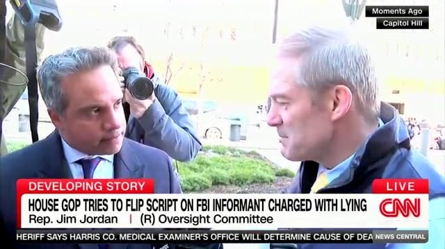 CNN correspondent Manu Raju confronts Jim Jordan on discredited FBI informant Alexander Smirnov.