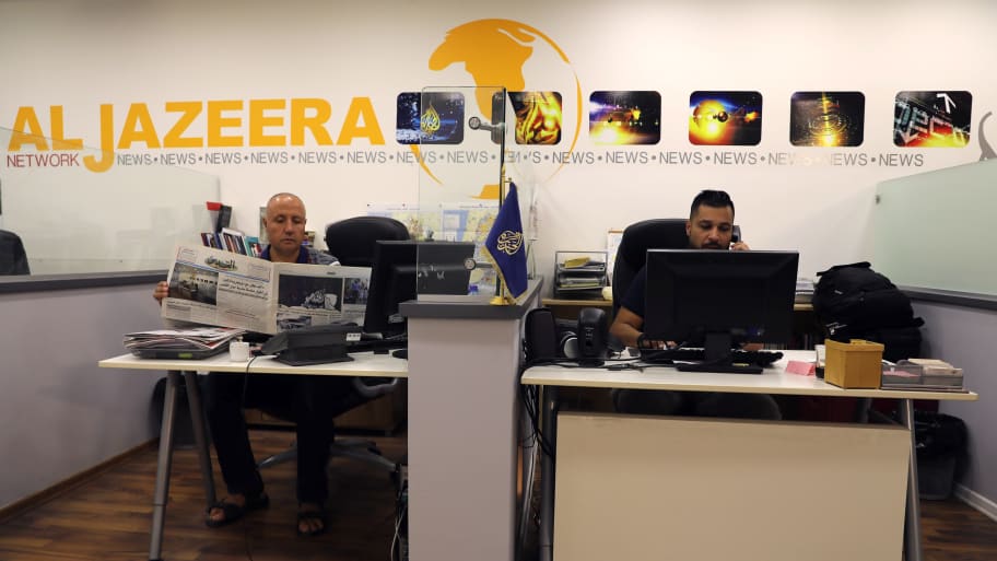 Employees work out of Al Jazeera’s Jerusalem office.