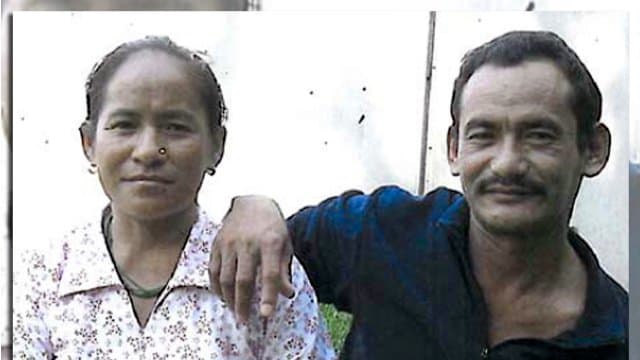 This undated photo provided by the Philadelphia District Attorney's Office shows Karnamaya Mongar and her husband.