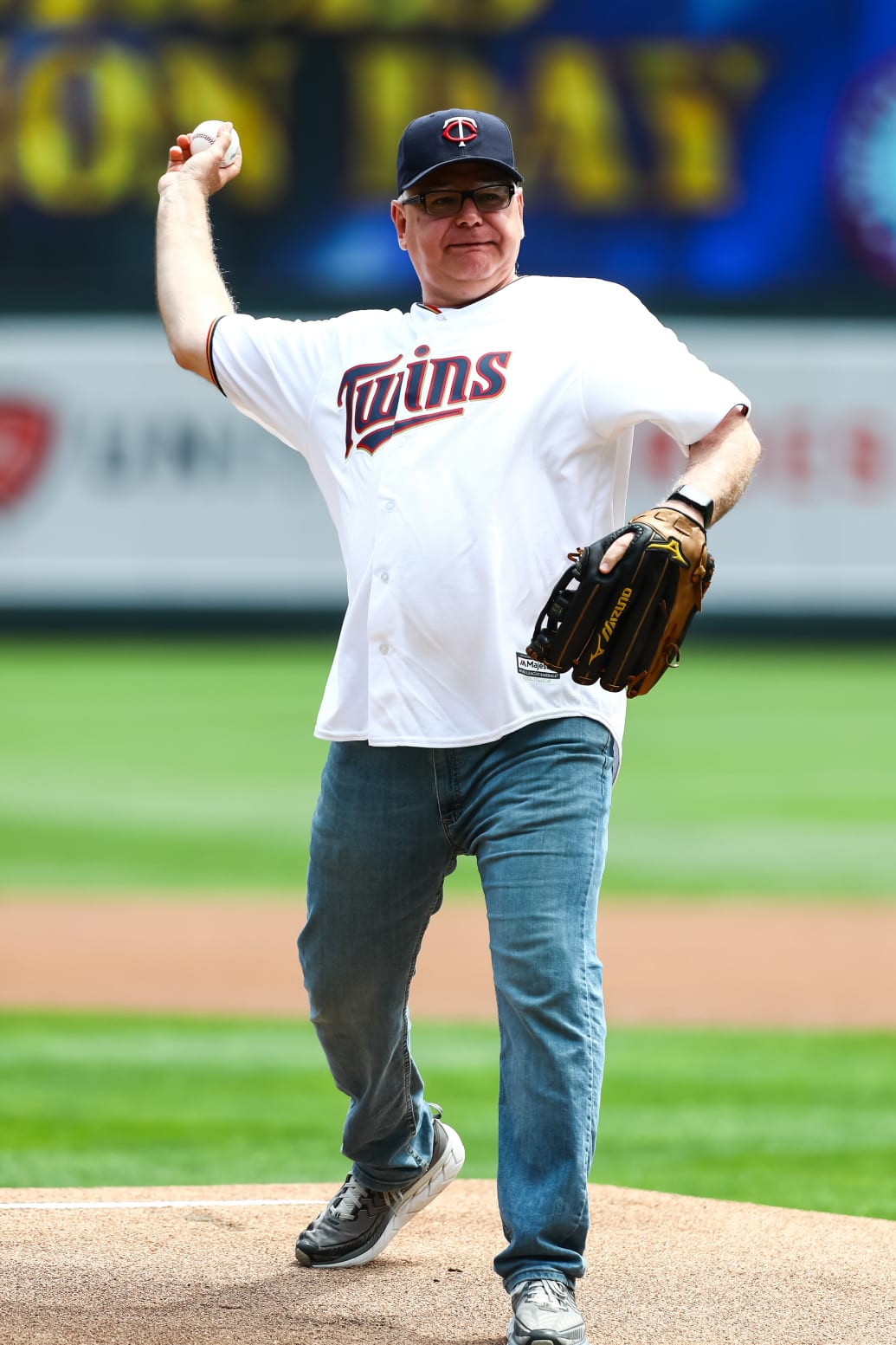 Tim Walz throws out the ceremonial first pitch before a game between the Texas Rangers and the Minnesota Twins at Target Field, Jul 7, 2019.