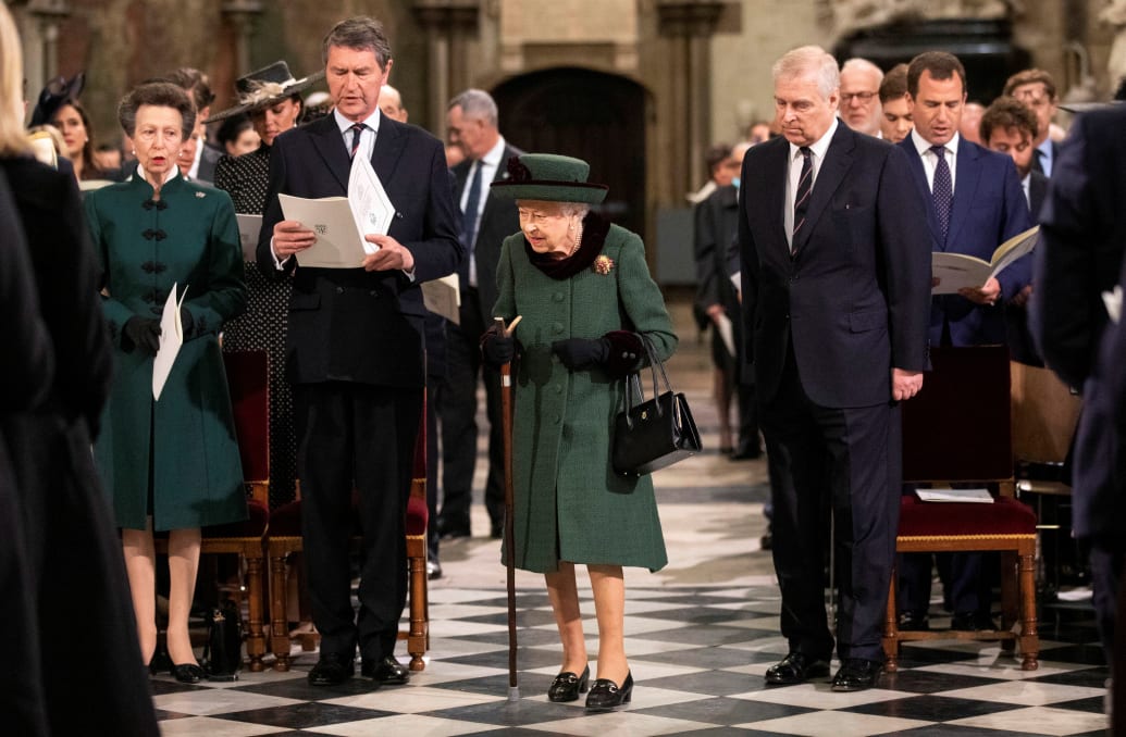 Queen Elizabeth, accompanied by Prince Andrew, Duke of York, attends a service of thanksgiving for late Prince Philip, Duke of Edinburgh, at Westminster Abbey in London, Britain, March 29, 2022.