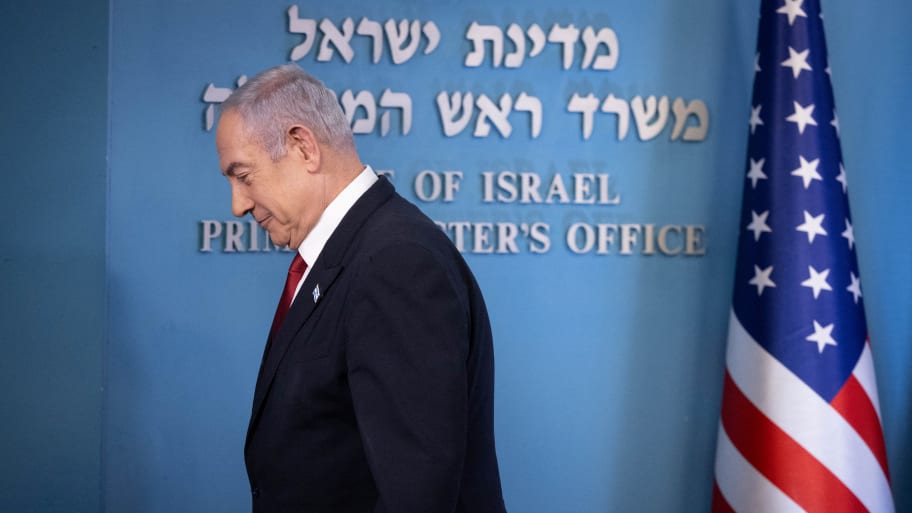 Israeli Prime Minister Benjamin Netanyahu walking.