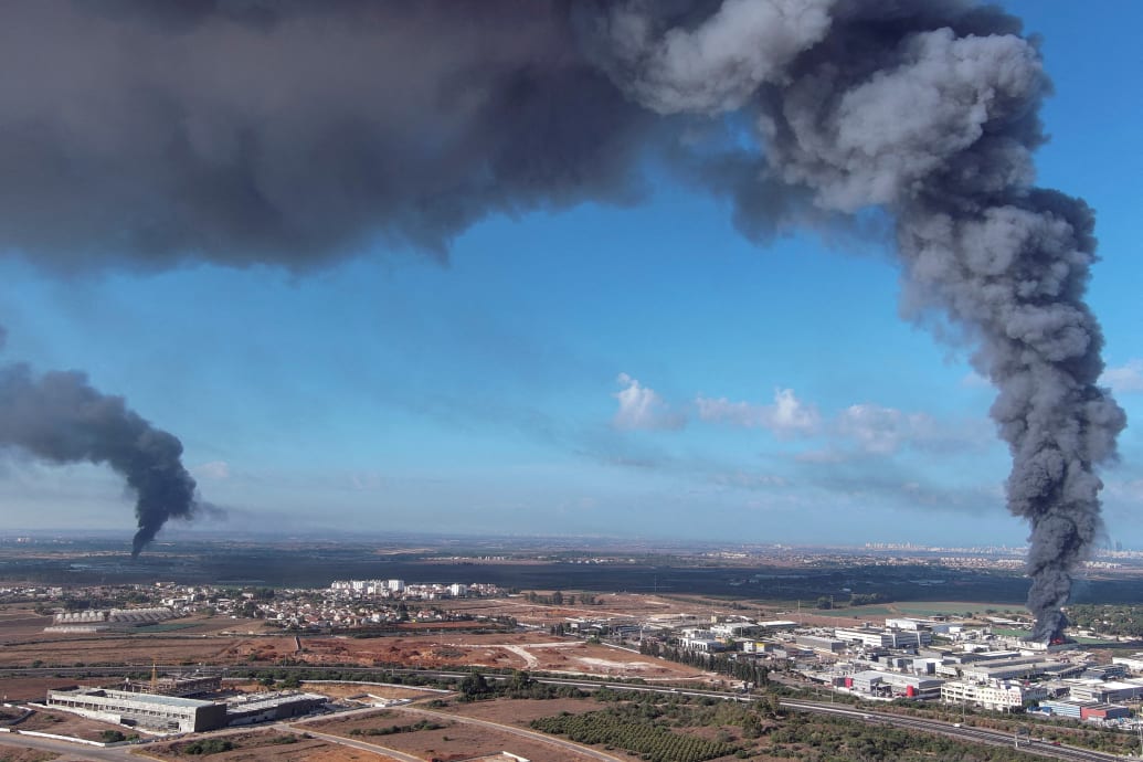 Smoke is seen in the Rehovot area as rockets are launched from the Gaza Strip.