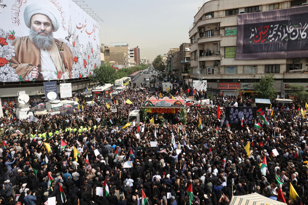 Iranians flood the streets for a funeral for Ismail Haniyeh.