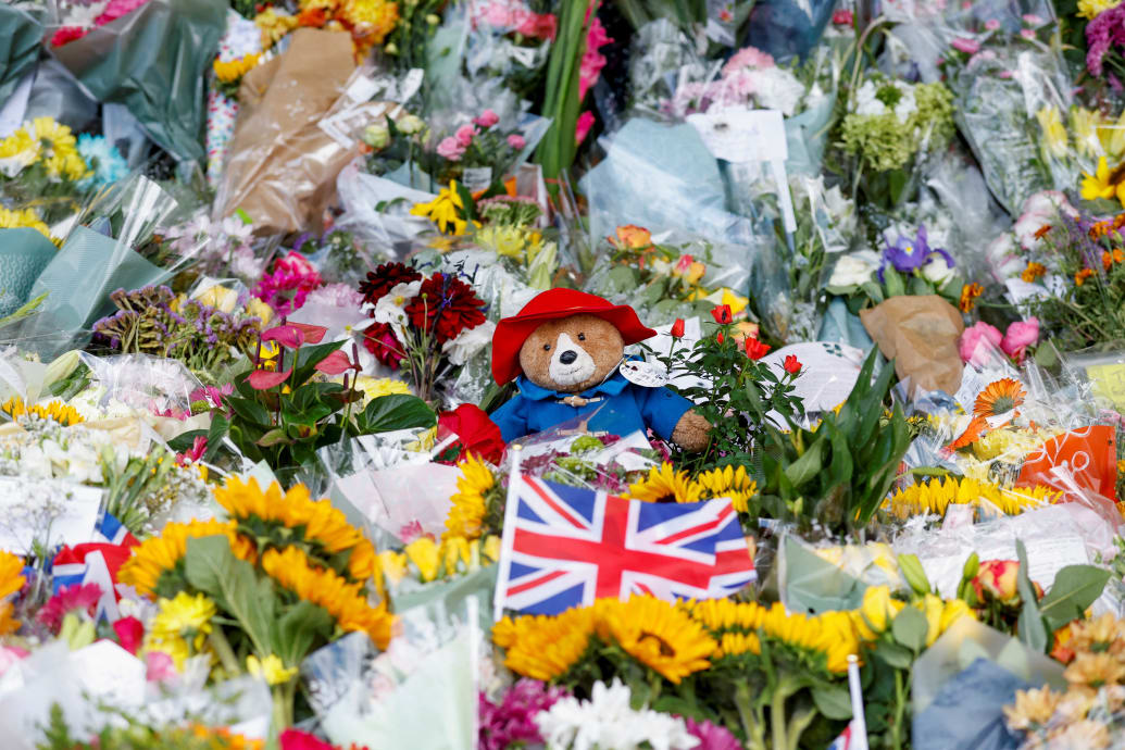 A Paddington Bear toy is placed among floral tributes at the Sandringham Estate, following the death of Britain's Queen Elizabeth, in eastern England, Britain, September 13, 2022.