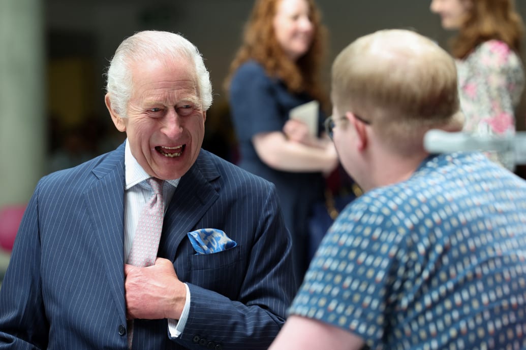 King Charles meets with patient Jasper Keech during a visit to the University College Hospital Macmillan Cancer Centre in London, Britain, April 30, 2024.