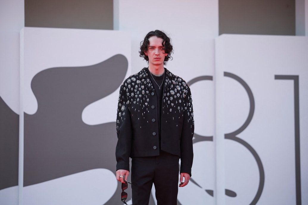 Kodi Smit-McPhee poses on the red carpet during the Venice Film Festival on August 29, 2024.