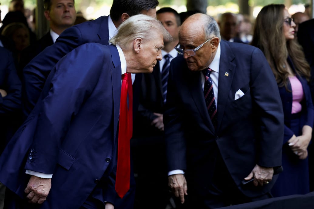 Giuliani and Donald Trump attend a ceremony marking the 23rd anniversary of the September 11, 2001 attacks on the World Trade Center at the 9/11 Memorial and Museum in the Manhattan borough of New York City, U.S., September 11, 2024.