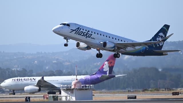 An Alaska Airlines flight taking off.