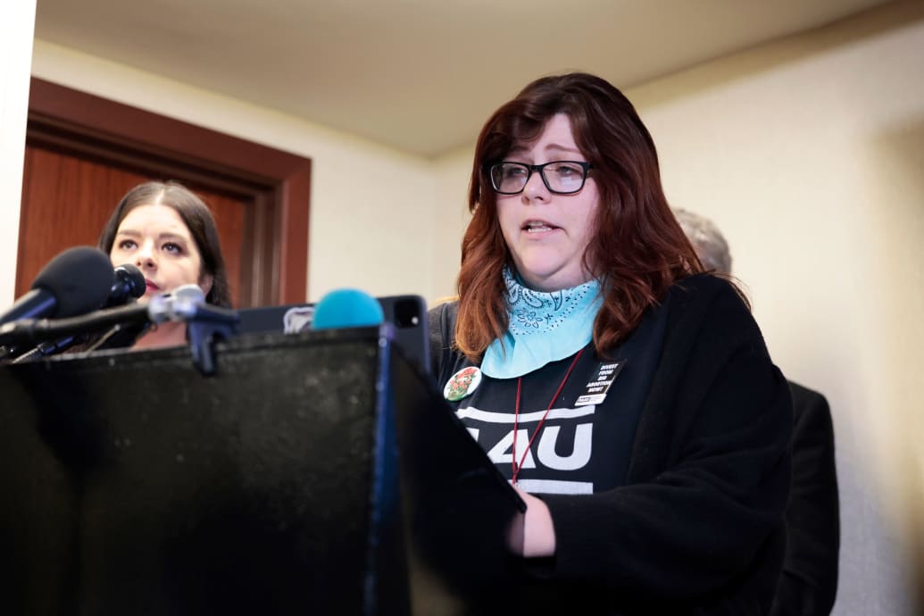 A photograph of anti-abortion activist Lauren Handy speaking at a news conference..