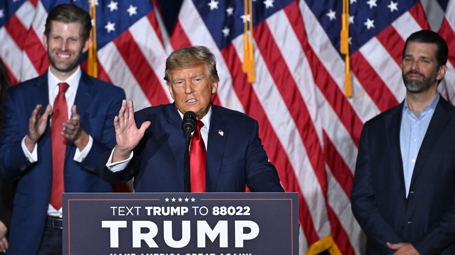 Former US President and Republican presidential hopeful Donald Trump, with sons Eric and Donald