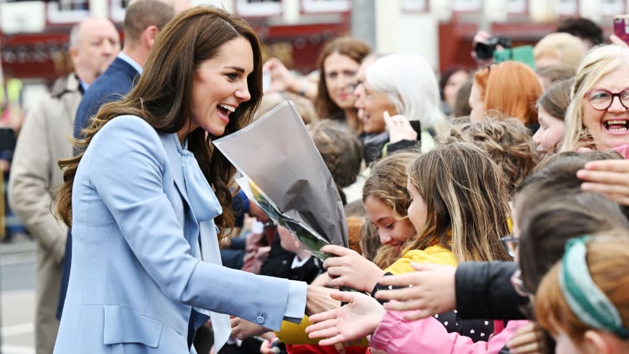 Kate Middleton visits with children on the street as she arrived in Northern Ireland.