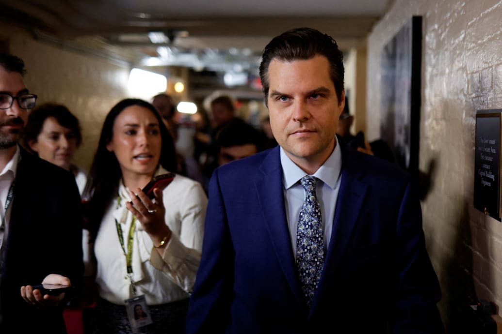 Representative Matt Gaetz (R-FL) is trailed by reporters after a House Republican conference meeting