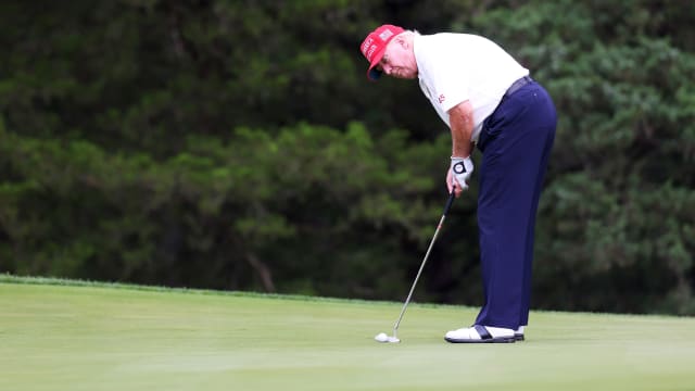 Former President Donald Trump putts at Bedminster in 2023