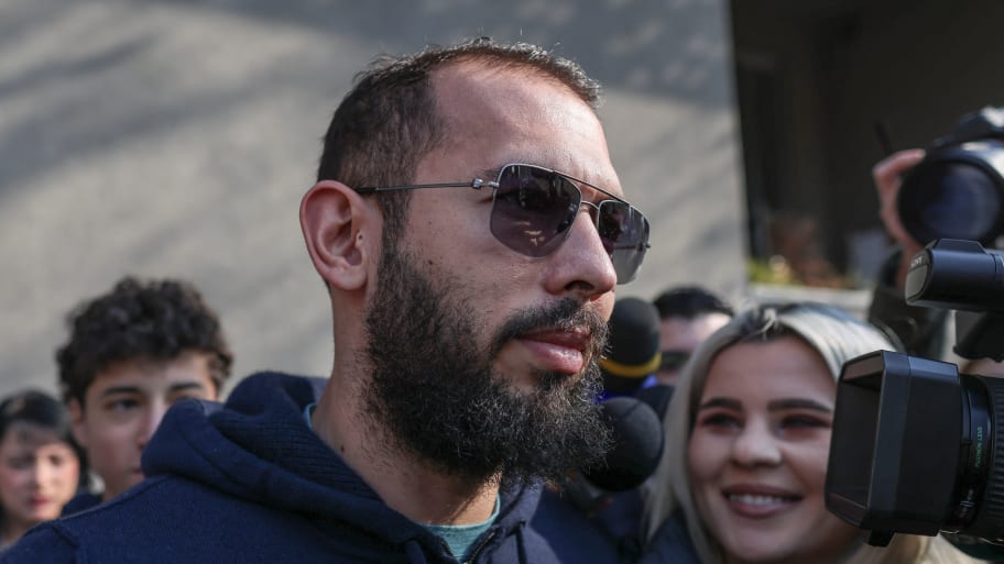 A picture of Andrew Tate, a self-described misogynist influencer facing charges of rape, human trafficking, and organized crime in Romania. A U.S. legal adviser for two of his accusers say Tate’s “troll army” has harassed and threatened them.