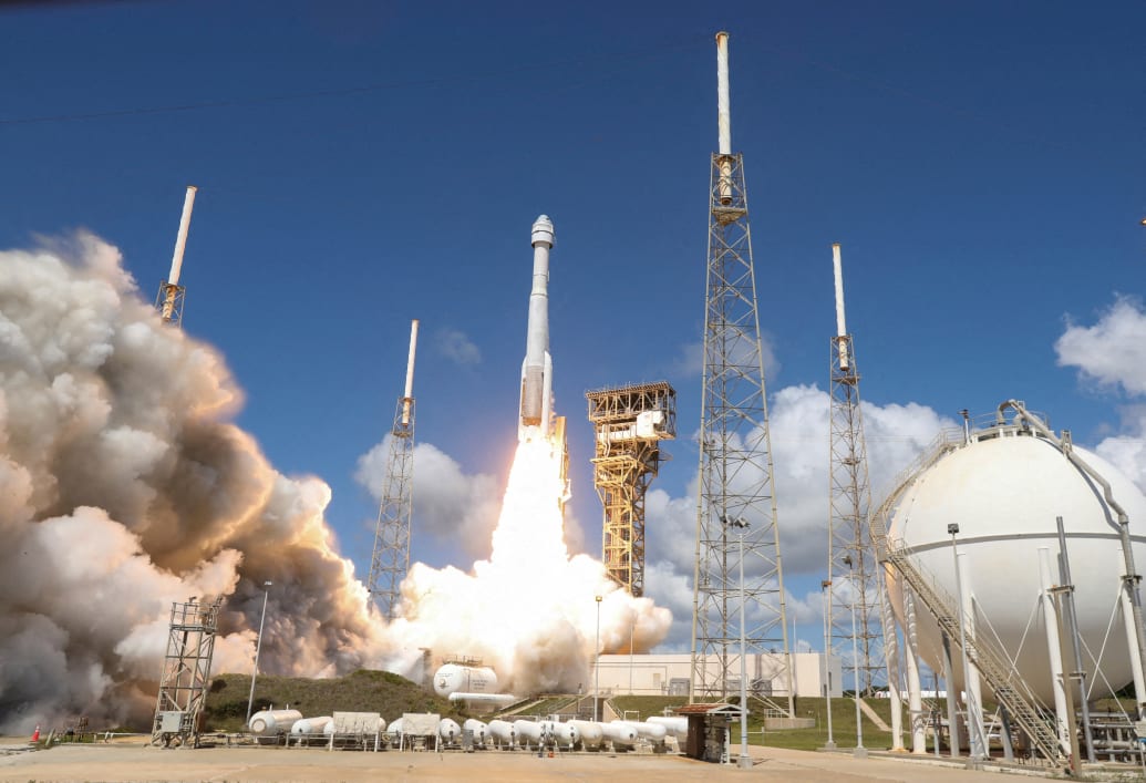 A United Launch Alliance Atlas V rocket carrying two astronauts aboard Boeing's Starliner-1 Crew Flight Test.