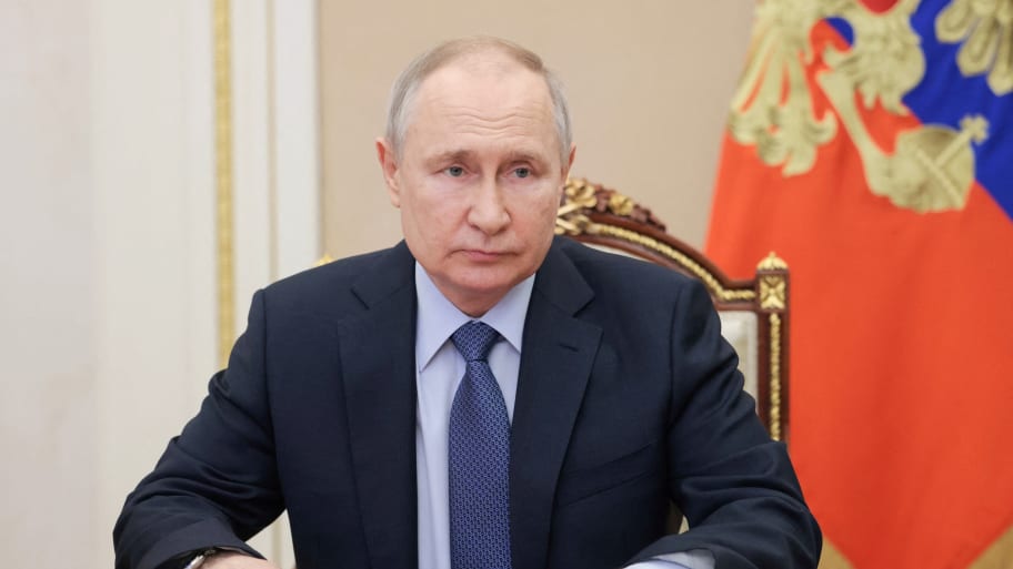 Vladimir Putin chairing a Security Council meeting.