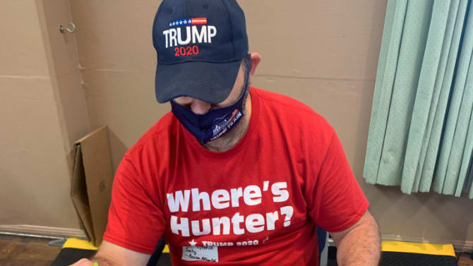 A California poll worker dressed upside down with the 2020 Trump march that has been fired