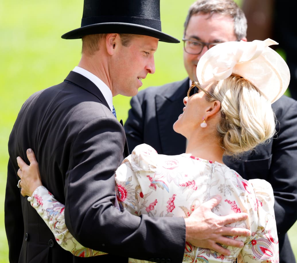 Prince William, Prince of Wales greets Zara Tindall as they attend day two of Royal Ascot 2024 at Ascot Racecourse on June 19, 2024 in Ascot, England.