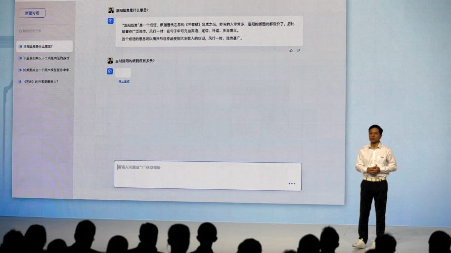 Baidu’s co-founder and CEO Robin Li showcases artificial intelligence-powered chatbot known as Ernie Bot by Baidu during a news conference at the company’s headquarters in Beijing, China, March 16, 2023. 