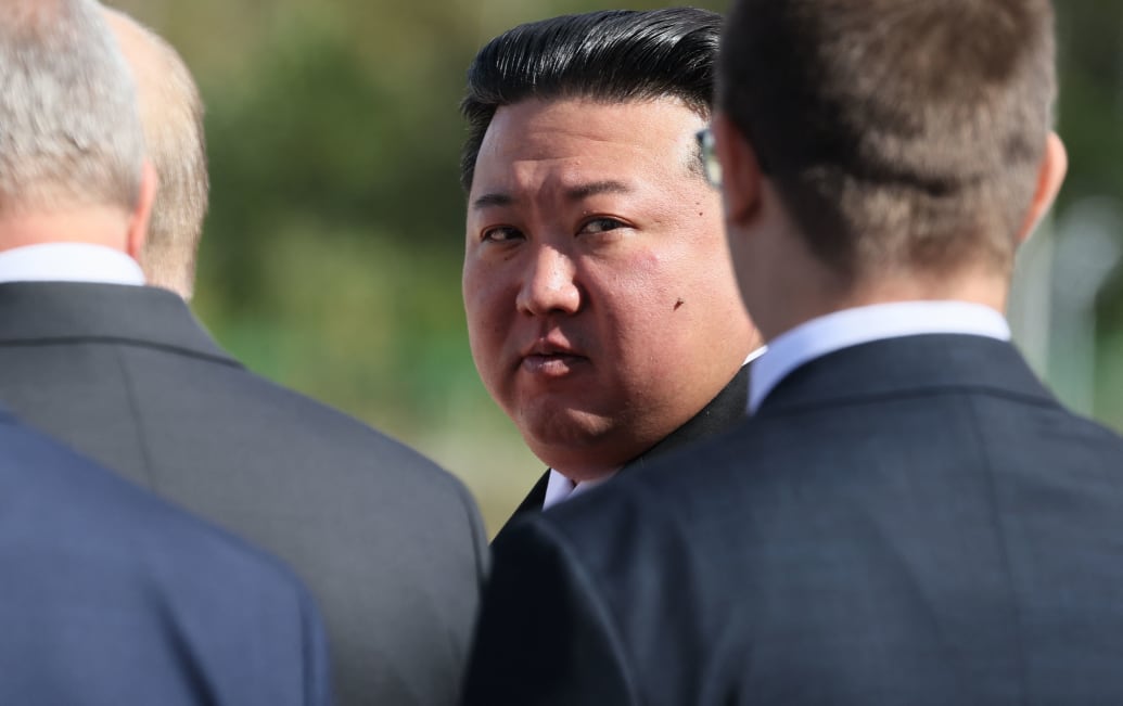 A close up photo of Kim Jong Un 