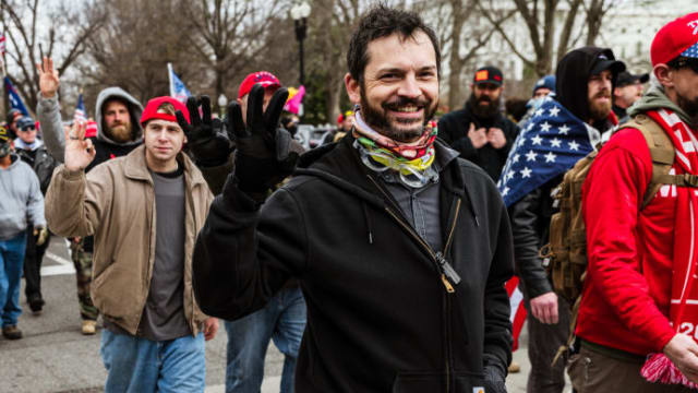 Proud Boy Marc Bru and fellow pro-Trump supporters march in front of the Supreme Court on January 6, 2021.