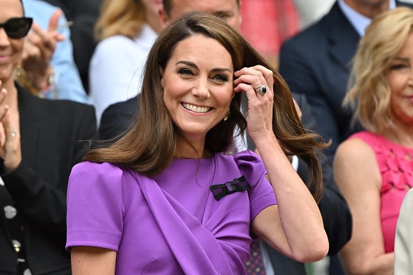 Britain's Catherine, Princess of Wales reacts as she arrives in the Royal Box on Centre Court to attend the men's singles final tennis match at Wimbledon, on July 14, 2024.