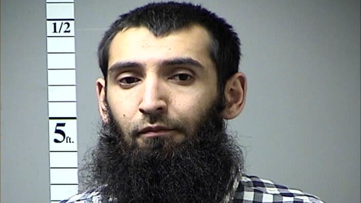 Sayfullo Saipov poses for a booking photo after a previous arrest in Missouri. Saipov was arrested after allegedly driving a pickup truck on a bike path in lower Manhattan, killing 8 peple and injuring 12 on October 31, 2017.