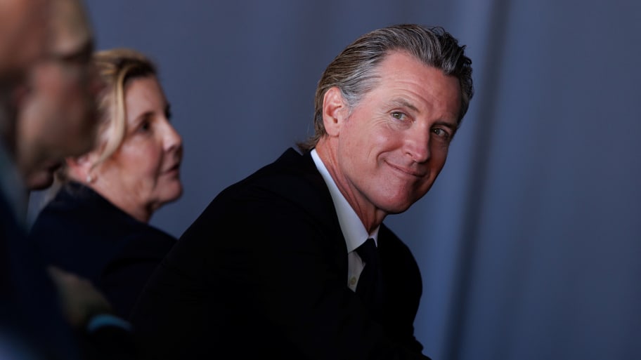 Gavin Newsom, Governor, State of California sits in the audience to listen to a session on Artificial Intelligence at the 2023 Milken Institute Global Conference in Beverly Hills, California.