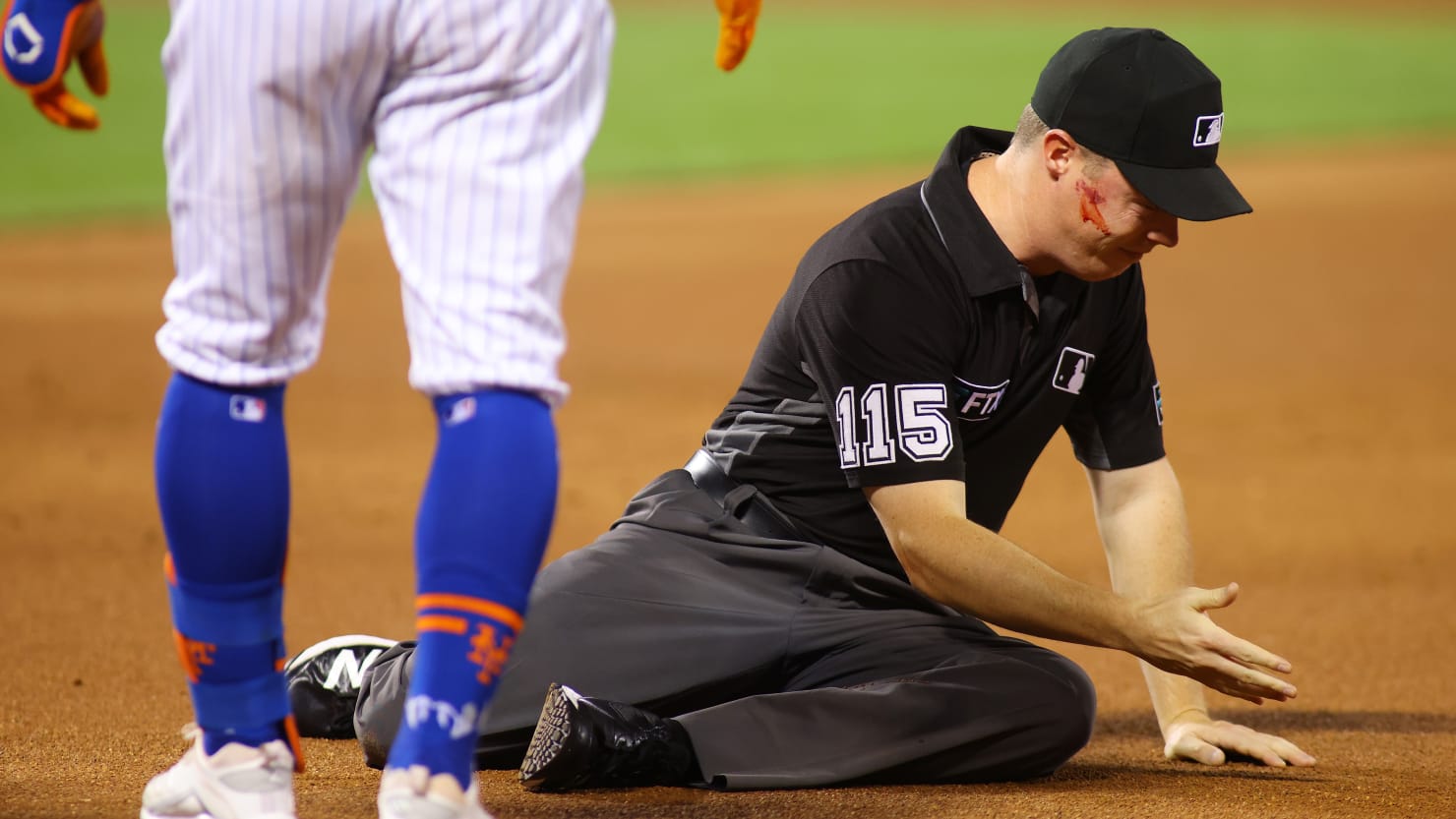 Video: MLB Umpire Floored by Brutal Stray Ball to the Head