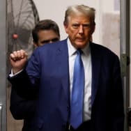 Former U.S. President Donald Trump returns to the courtroom after a short break during his hush-money trial at Manhattan Criminal Court in New York City, May 20, 2024.