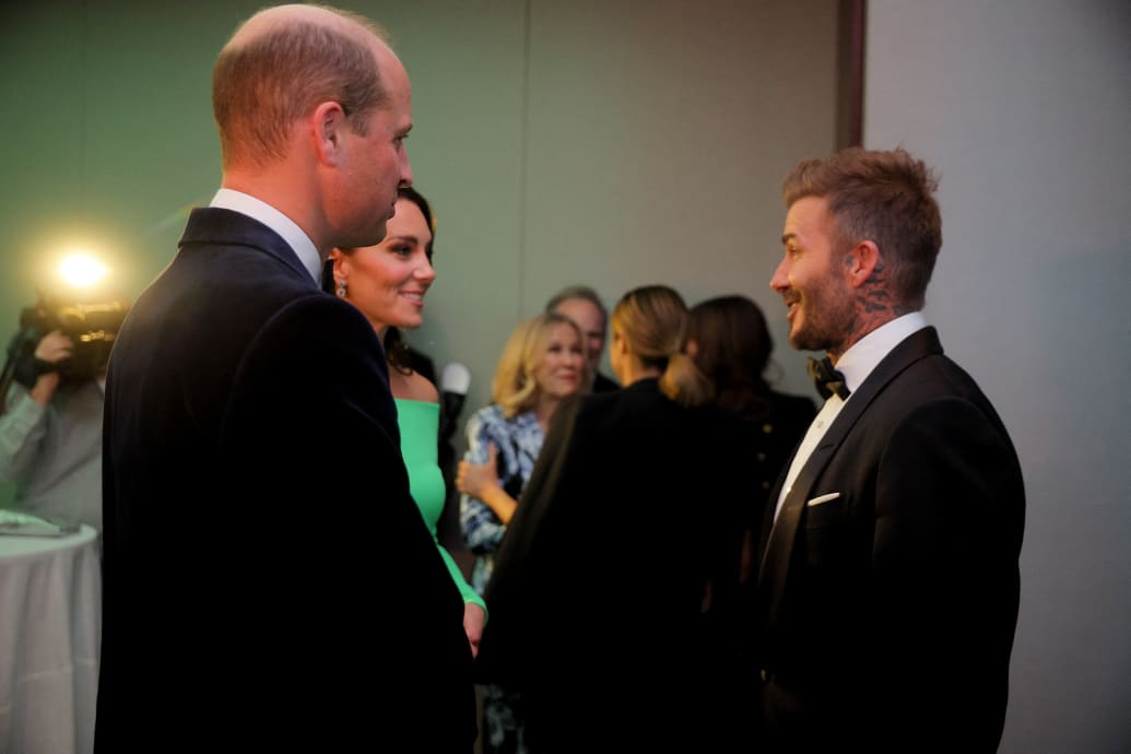 Britain's Prince William, Prince of Wales and Catherine, Princess of Wales, speak with former football player David Beckham, after attending the second annual Earthshot Prize Awards ceremony at the MGM Music Hall at Fenway, in Boston, Massachusetts.